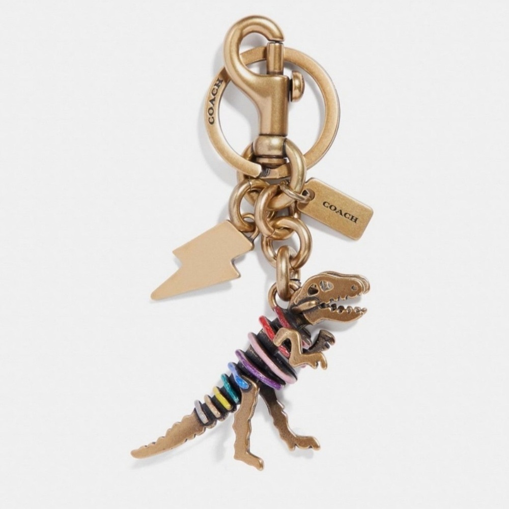 Coach Rexy dinosaur t-rex gold and rainbow bag charm keychain